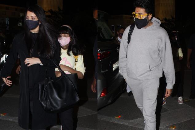 aadhya躲在Aishwarya Rai后面，CISF官员要求Abhishek Bachchan在机场摘掉面具