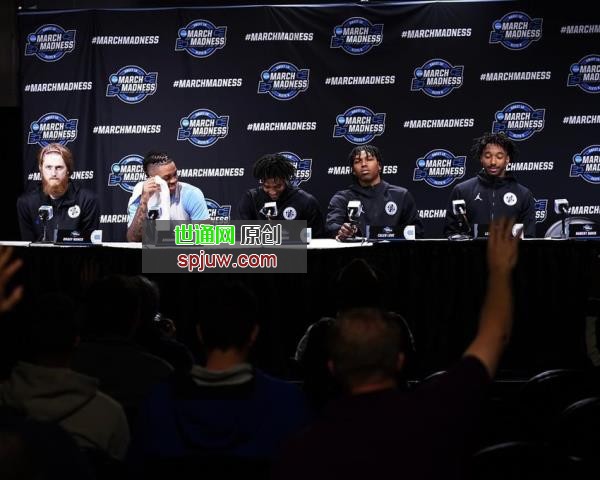 North Carolina players react during a news co<em></em>nference for the NCAA men's college basketball tournament, Thursday, March 24, 2022, in Philadelphia.