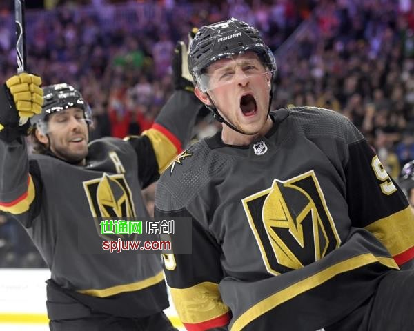 Vegas Golden Knights center Jack Eichel (9) and center Chandler Stephenson (20) celebrate Eichel's power-play goal against the Nashville Predators during the second period of an NHL hockey game Thursday, March 24, 2022, in Las Vegas.