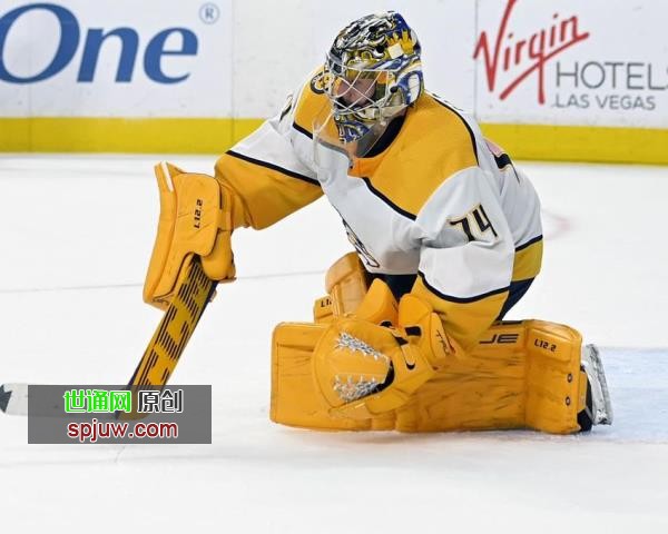 Nashville Predators goaltender Juuse Saros makes a save against the Vegas Golden Knights during the second period of an NHL hockey game Thursday, March 24, 2022, in Las Vegas.