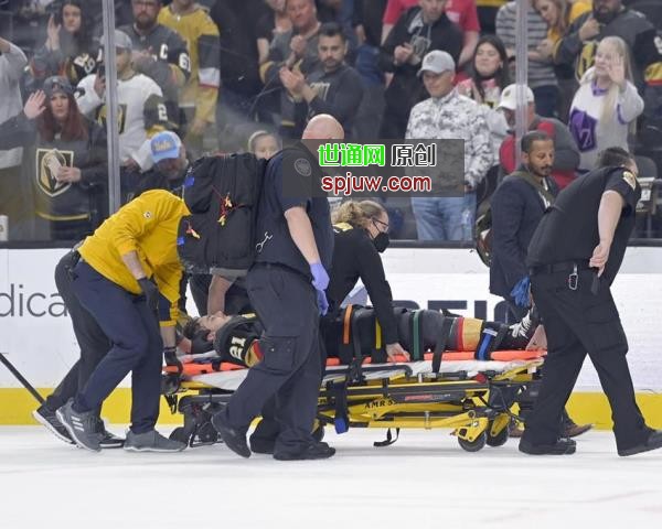 Vegas Golden Knights center Brett Howden is carried off the ice after an injury during the first period of an NHL hockey game against the Nashville Predators, Thursday, March 24, 2022, in Las Vegas.