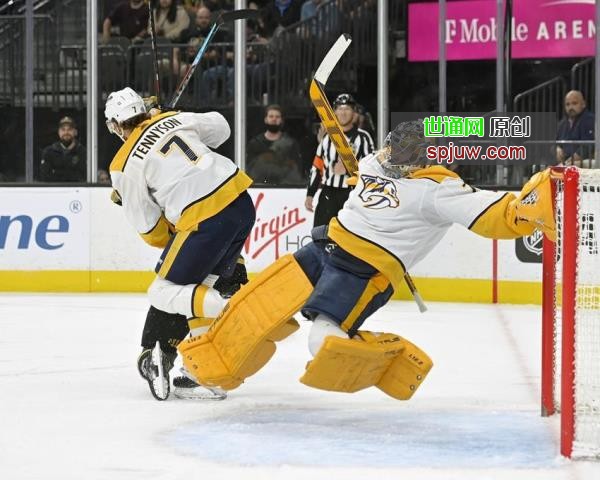 Nashville Predators goaltender Juuse Saros (74) falls after slipping on the ice during the second period of the team's NHL hockey game against the Vegas Golden Knights on Thursday, March 24, 2022, in Las Vegas.